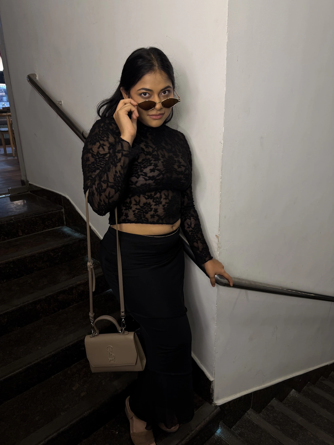 Professional portrait of Vishwa Dharani, makeup artist in Madurai, wearing elegant traditional attire with natural makeup